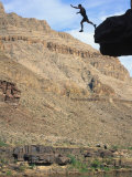 Man Jumping off Cliff, Grand Canyon Natl Park, AZ Photographic Print by Wiley & Wales 