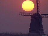 Windmill at Sunset Photographic Print