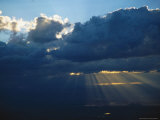 Cloud with Ray of Sunlight Photographic Print by Bruce Clarke