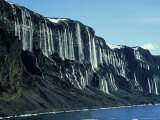 Waterfalls Cascading Down Cliffs, Vega Isle, East Side Antarctic Peninsula Photographic Print by Rick Price