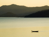 Passenger Boat on Lake Burera Near Ruhengeri at the Virunga Mountains, Rwanda Photographie par Ariadne Van Zandbergen