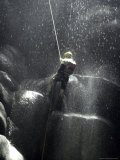 Climber Showered with Water in Cave, Mexico Photo by Michael Brown