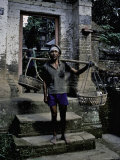 A Fisherman on His Doorstep, Indonesia Posters by Michael Brown