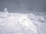 Climbers Crossing a Dark and Snowy Khumbu Ice Fall, Nepal Print by Michael Brown