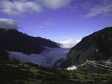 Prayer Flags in Mountains, Nepal Prints by Michael Brown