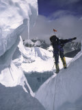 Climber Scaling the Khumbu Ice Fall, Nepal Prints by Michael Brown