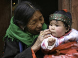Woman with Child, Tibet Posters par Michael Brown