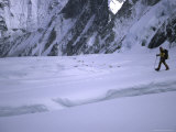 Climber Passing by High Camp, Nepal Print by Michael Brown