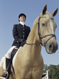 Low Angle View of a Jockey Sitting on a Horse Lámina fotográfica