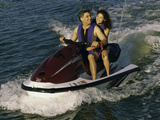 Mid Adult Couple Riding a Jet Ski Photographic Print