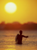 Fisherman at Sunset Photographic Print