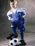 Portrait of a Boy Standing with His Foot on a Soccer Ball Photographic Print