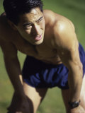 Asian Man Pausing During Workout Photographic Print