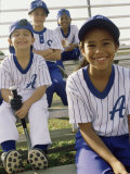 Portrait of a Group of Children Sitting on Bleachers Photographic Print