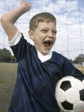 Boy Holding a Soccer Ball Photographic Print