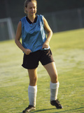 Teenage Girl on a Soccer Field Photographic Print