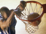 Basketball Player Slam Dunking a Ball Photographic Print