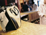 Close-up of a Hand Bag on a Counter Photographic Print