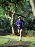 Man Jogging on a Path Photographic Print