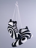 Sneakers Dangling by the Laces Photographic Print