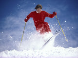 Skier in Red Against Blue Sky Background Photographic Print