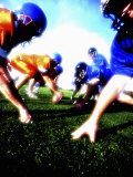 Team of Football Players on a Football Field Photographic Print