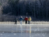 Ice Skaters Photographic Print