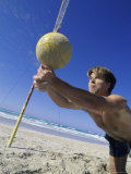 Man Diving for Volleyball on Beach Photographic Print