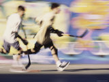Motion Blurred Image of Teens Playing Street Hockey Photographic Print