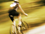 Motion Blurred Image of a Cyclist Photographic Print