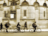 Cyclists on a City Street Photographic Print