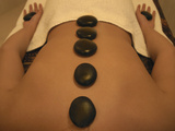 Young Woman with Therapeutic Stones on Her Back Photographic Print