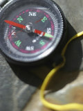 Close-Up of a Compass Lámina fotográfica