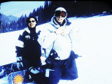 Couple Kneeling Down in the Snow Photographic Print