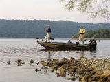 Two People Standing in a Boat Fishing Photographic Print