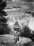 Male Mountain Biking Outdoors, Pemberton, British Columbia, Canada Lámina fotográfica