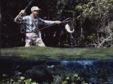 Fisherman Netting a Fish Photographic Print