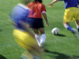 Soccer Players in Motion Photographic Print