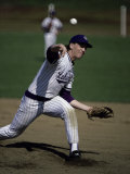 Pitcher Throwing a Baseball Photographic Print