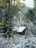 Rustic Cabin in Snow Scene Photographic Print