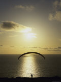Silhouette of a Parasailor at Sunset Photographic Print
