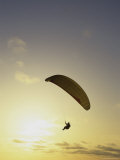 Silhouette of a Parasailor at Sunset Photographic Print