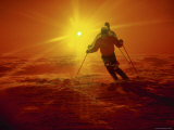 Sun Setting Behind Two Skiers Photographic Print Sun Setting Behind Two Skiers Photographic Print