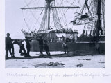 Unloading One of the Motorised Sledges Onto the Sea-Ice, from Scott's Last Expedition Photographic Print by Herbert Ponting