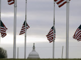 Flags at the Washington Monument Fly at Half Staff Photographic Print by Gerald Herbert