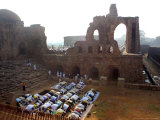 Muslims Offer Eid Prayers at the Ruins of Jami Mosque, Which was Built in 1345 AD Photographic Print by Manish Swarup