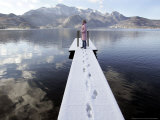 A Young Girl Enjoys the Sunny Winter Weather Photographic Print by Christof Stache