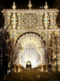People Walk Through a Tunnel of Illumination Titled Tokyo Millenario Photographic Print