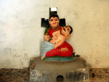 A Statue of a Woman Who Committed Sati 60 Years Ago Cradling Her Husband Photographic Print by Manish Swarup