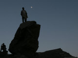 An Afghan Man Stands on a Huge Rock Next to the Now Abad Dinazung Monument Photographic Print by Rodrigo Abd